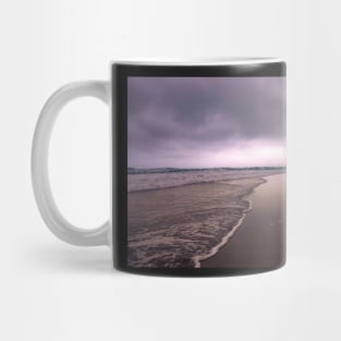 Black clouds on the beach Mug